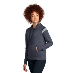 New Era ® Ladies Heritage Blend Varsity Hoodie -Travel Storage Store LNEA108 truenavyheathertruenavyrainstormgreyheather model 3q 550x550.jpg