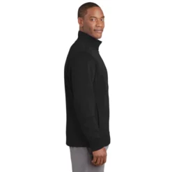 Sport-Tek® Sport-Wick® Fleece Full-Zip Jacket -Travel Storage Store ST241 Black model side 042015 550x550.jpg